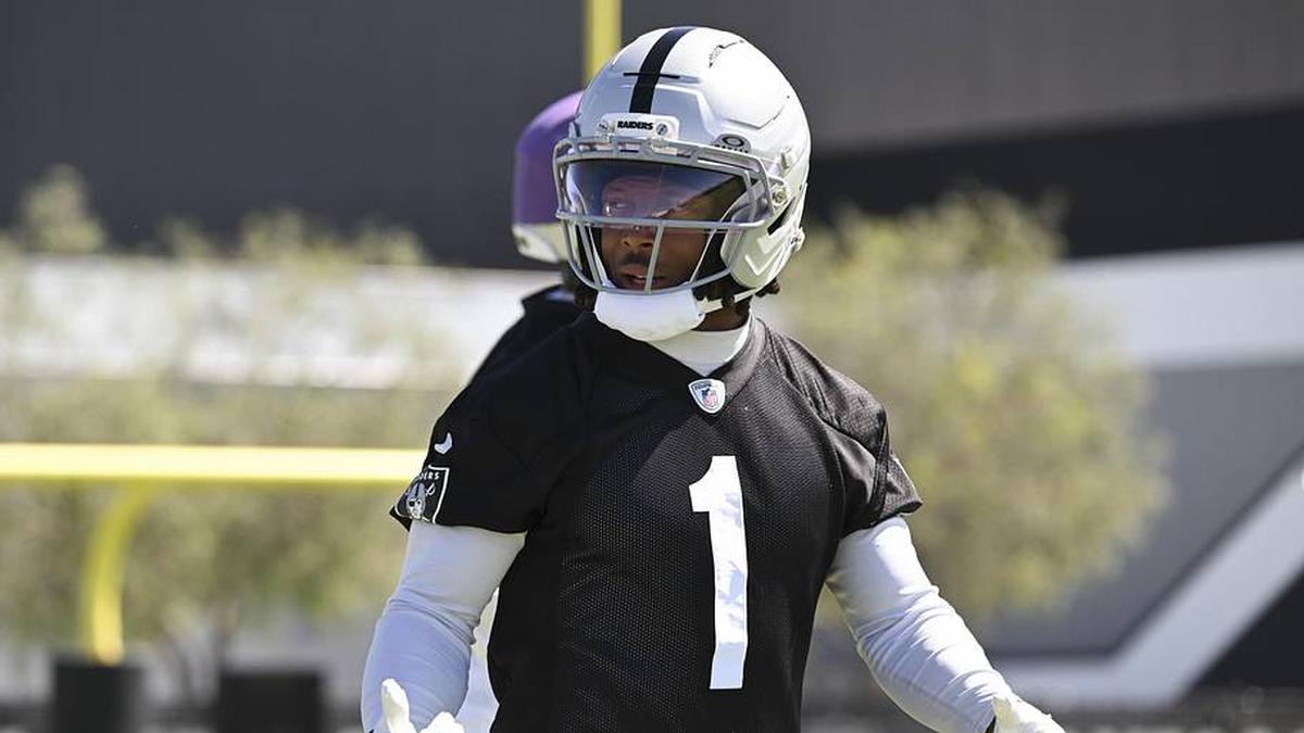  May 28, 2026; Henderson, NV, USA; Las Vegas Raiders wide receiver Tre Tucker (1) runs through a drill during organized team activities at Intermountain Health Performance Center. Mandatory Credit: Candice Ward-Imagn Images | Candice Ward-Imagn Images 