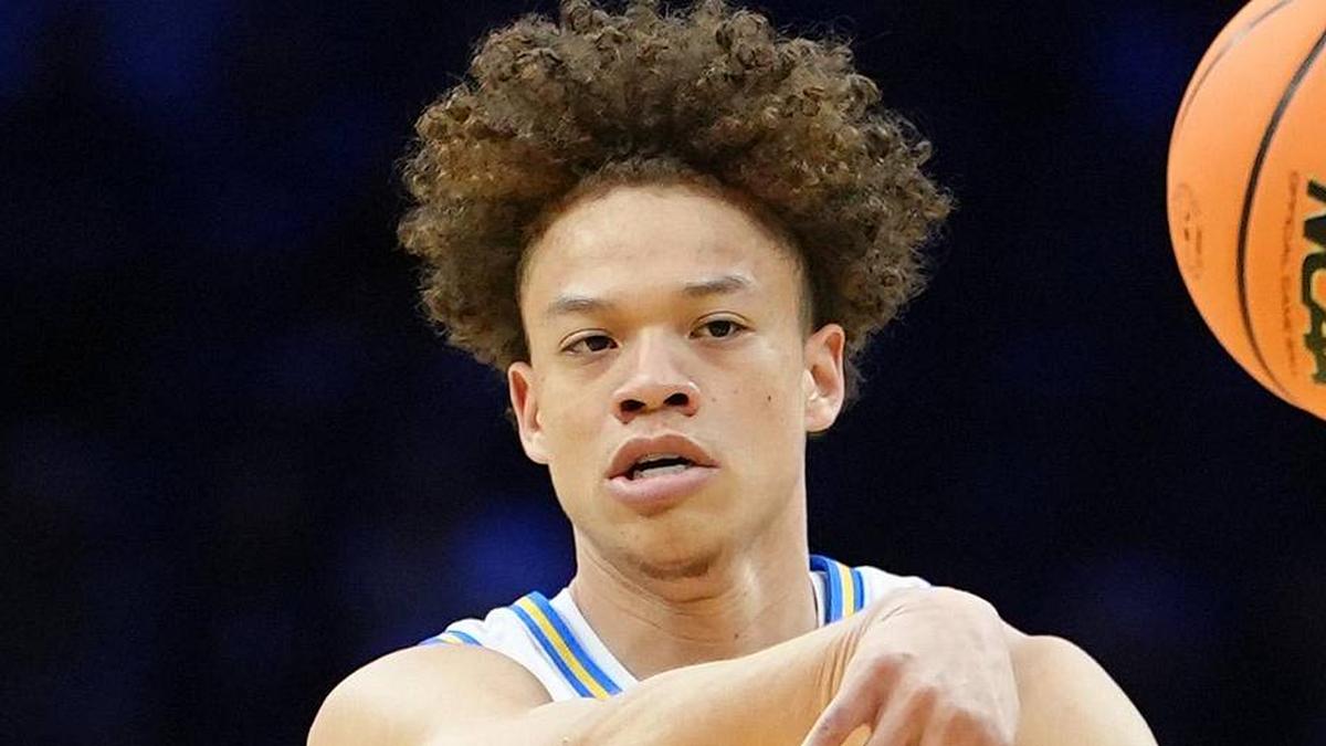  Mar 20, 2026; Philadelphia, PA, USA; UCLA Bruins guard Trent Perry (0) makes a pass against the UCF Knights in the first half during a first round game of the men's 2026 NCAA Tournament at Xfinity Mobile Arena. Mandatory Credit: Kyle Ross-Imagn Images | Kyle Ross-Imagn Images 