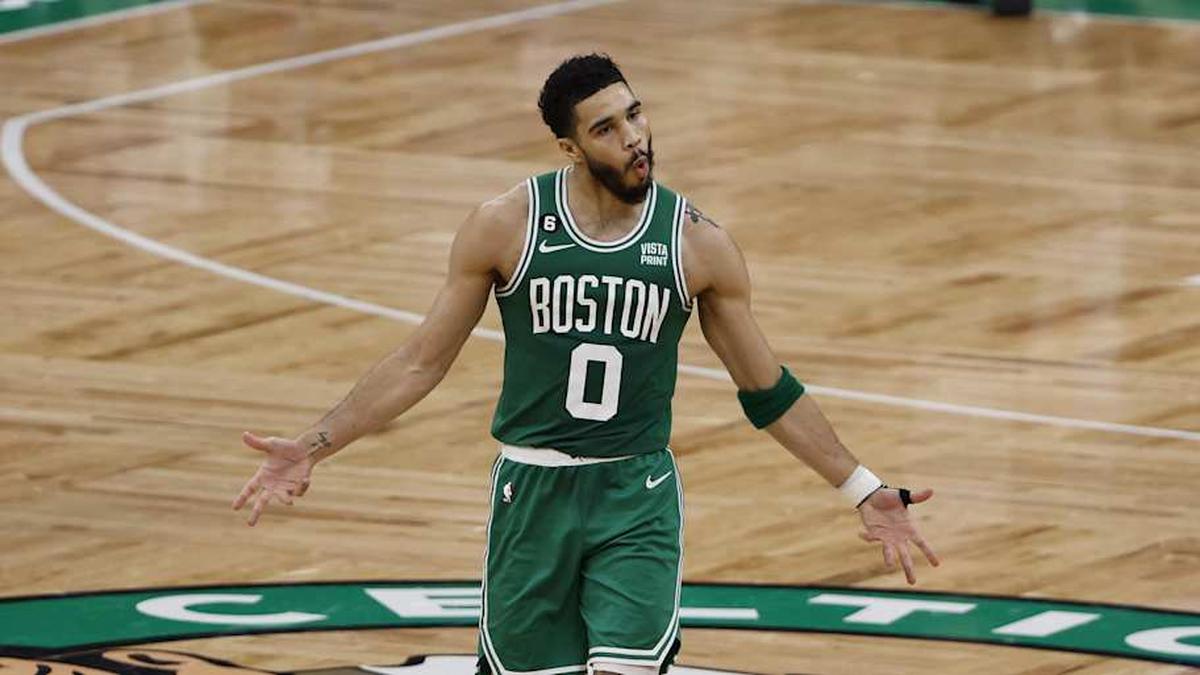  Celtics forward Jayson Tatum celebrates after making a three-point basket against the 76ers. | Winslow Townson-Imagn Images 