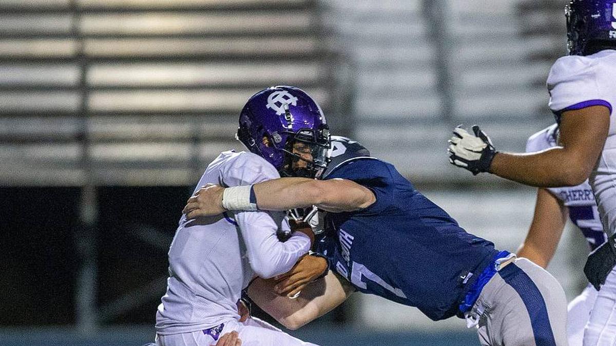  Cherry Hill West's Jordon DeJesus Gonzalez is sacked by Middletown South's Colin Gallagher and Luke Wafle during the first half of the Cherry Hill West vs. Middletown South NJSIAA Central Group 4 playoff football game at Middletown High School South in Middletown, NJ Friday, October 28, 2022. Mid03 | Tanya Breen / USA TODAY NETWORK 