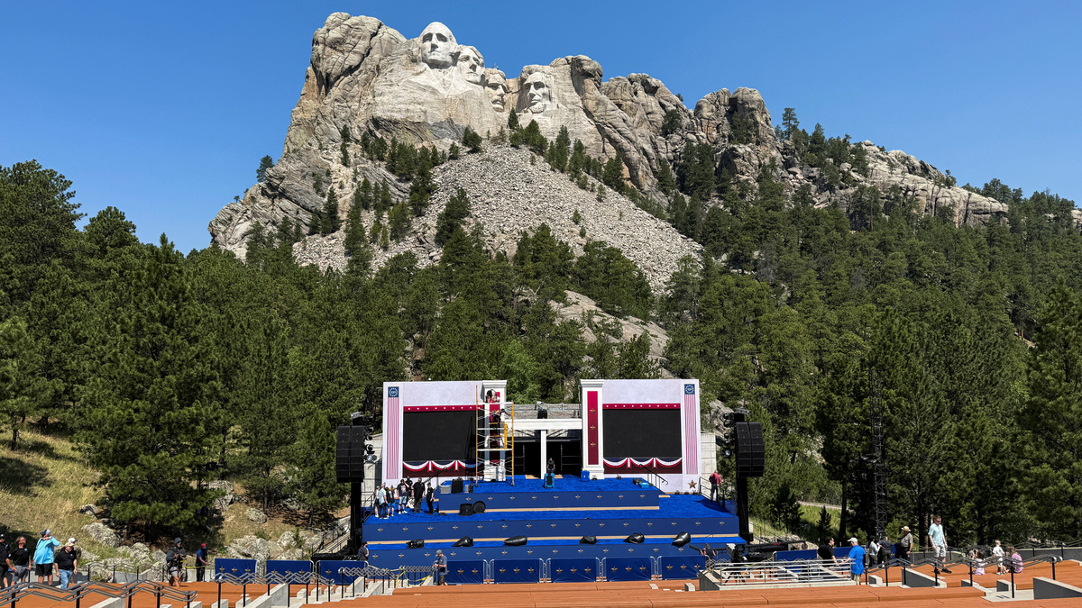 Members of the crew make final preparations as they set up a stage at Mount Rushmore National Memorial for the Fourth of July fireworks display, where U.S. President Donald Trump is expected to appear, in Keystone, South Dakota, U.S., July 2, 2026. REUTERS/Jane Ross