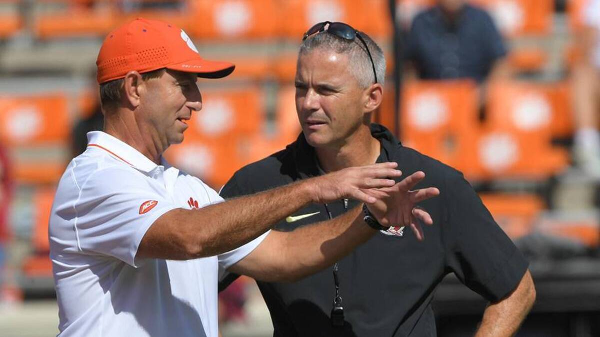  Sep 23, 2023; Clemson, South Carolina, USA; Clemson Tigers head coach Dabo Swinney and Florida State Seminoles head coach Mike Norvell before a game at Memorial Stadium. Mandatory Credit: Ken Ruinard-Imagn Images | Ken Ruinard-Imagn Images 