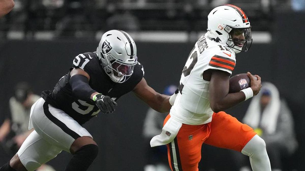  Nov 23, 2025; Paradise, Nevada, USA; Las Vegas Raiders defensive end Malcolm Koonce (51) tackles Cleveland Browns quarterback Shedeur Sanders (12) in the first half at Allegiant Stadium. Mandatory Credit: Kirby Lee-Imagn Images | Kirby Lee-Imagn Images 