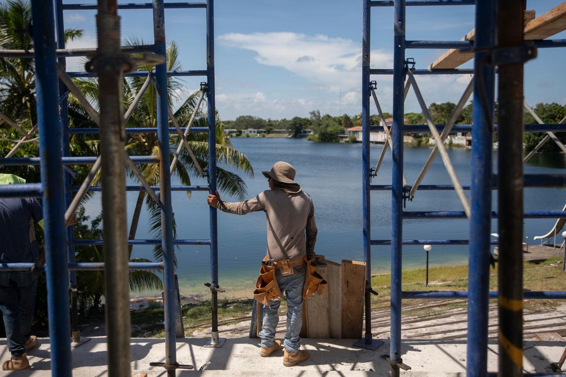 Cristian, a 14 year-old migrant, works on a construction site in North Miami, Fla. instead of going to school, on Aug. 30, 2022. Alone and exploited, migrant children who are arriving to the U.S. in record numbers are ending up in dangerous jobs that violate child labor laws — including in factories that make some of the country’s best-known products. The photo illustrated a story by Hannah Dreier of The New York Times which was awarded the 2024 Pulitzer Prize for Investigative Reporting. (Kirsten Luce/The New York Times)
