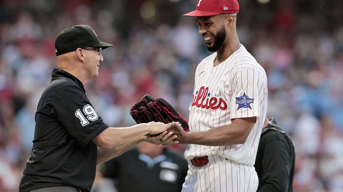 Philadelphia Phillies ace Cristopher Sanchez, right, is congratulated by umpire Vic Carapazza after setting the MLB record for most consecutive scoreless innings by a left-handed pitcher, against the San Diego Padres on Wednesday, June 3, 2026, in Philadelphia. (Elizabeth Robertson/The Philadelphia Inquirer/TNS)