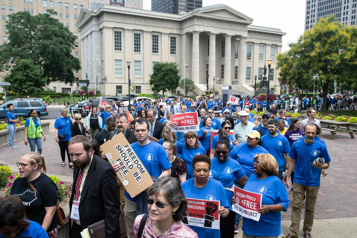Supporters of cash bail reform rally in 2019 in Louisville, Kentucky.