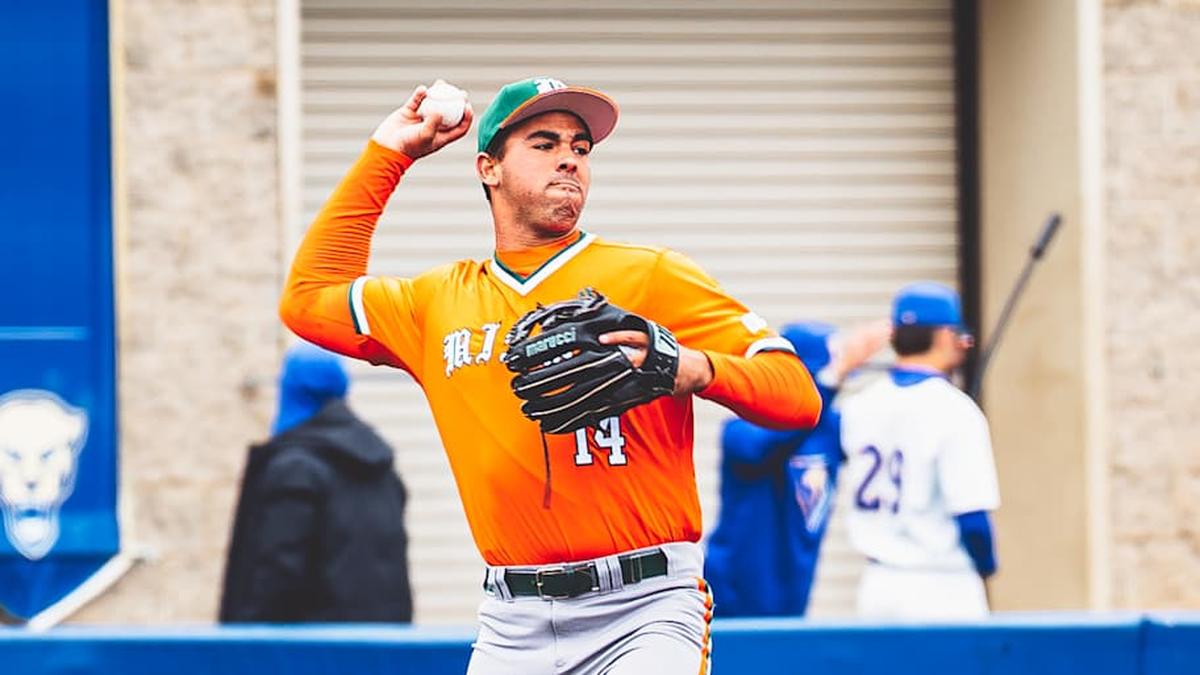  Miami Hurricanes third baseman Daniel Cuvet (14) against Pitt throwing to first baseman Todd Hudson (18) | Miami Hurricanes Athletics 