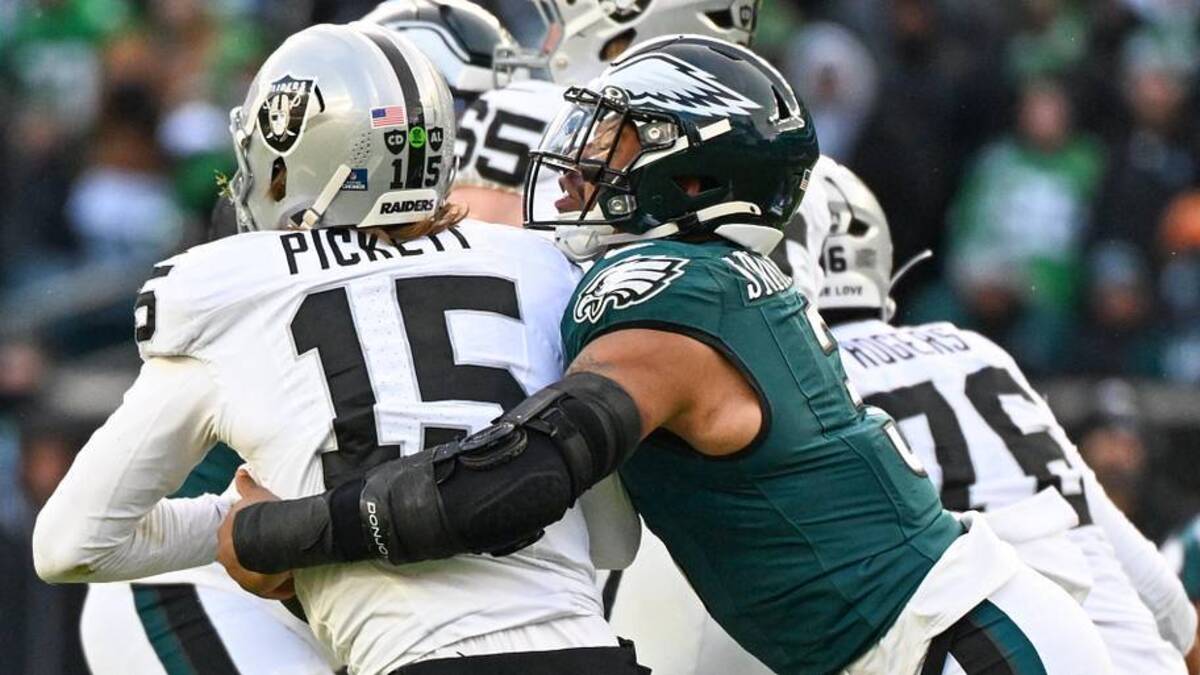  Dec 14, 2025; Philadelphia, Pennsylvania, USA; Las Vegas Raiders quarterback Kenny Pickett (15) is sacked by Philadelphia Eagles linebacker Nolan Smith Jr. (3) during the third quarter at Lincoln Financial Field. Mandatory Credit: Eric Hartline-Imagn Images | Eric Hartline-Imagn Images 