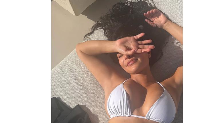 Kim Kardashian Rocks a Tiny White Bikini in Photo Dump With BF Lewis Hamilton 