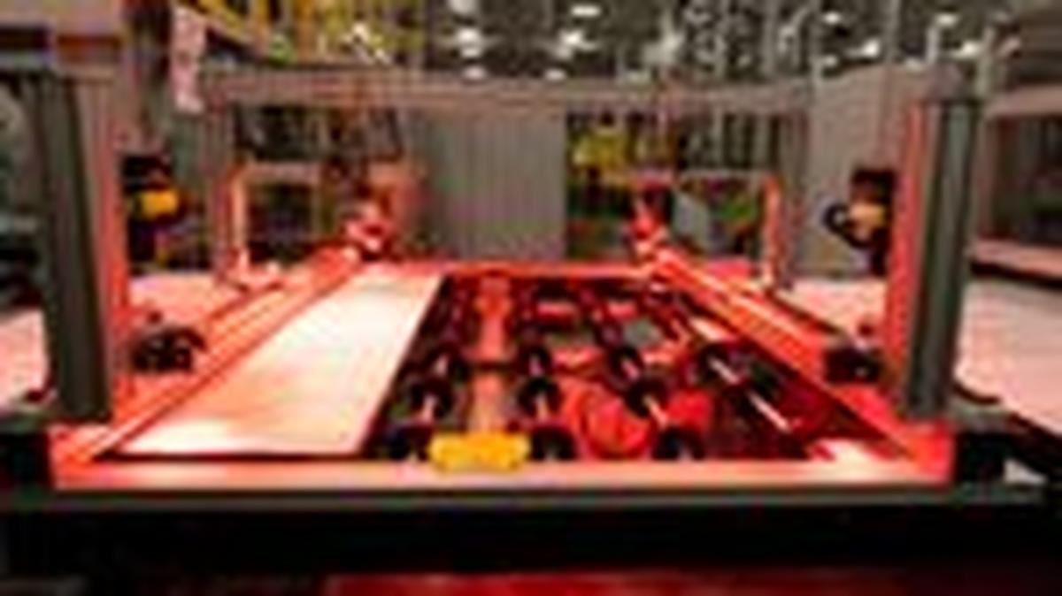 An assembly line moves solar panels through manufacturing at First Solar in Perrysburg, Ohio July 8, 2022. REUTERS/Megan Jelinger