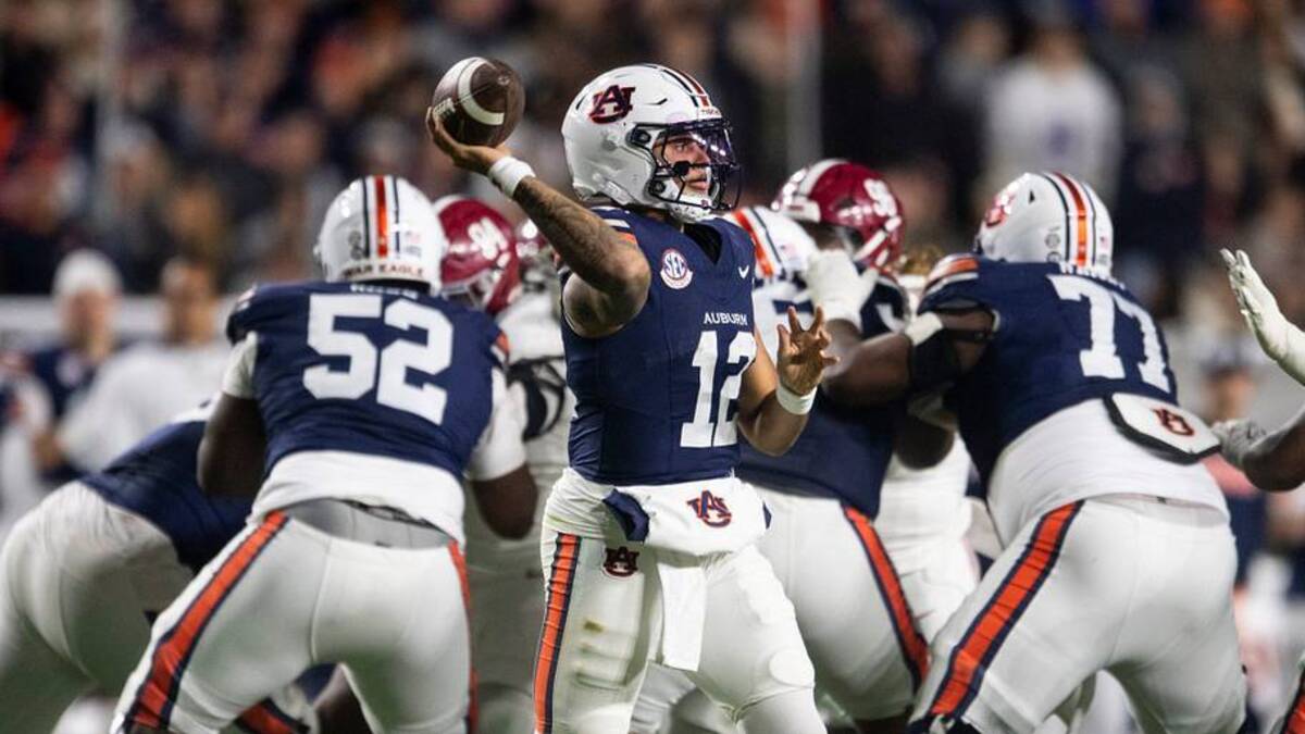  Auburn Tigers quarterback Ashton Daniels (12) throws the ball as Auburn Tigers take on Alabama Crimson Tide in the Iron Bowl at Jordan-Hare Stadium in Auburn, Ala. on Saturday, Nov. 29, 2025. Alabama Crimson Tide leads Auburn Tigers 17-6. | USA TODAY Network via Reuters Connect 