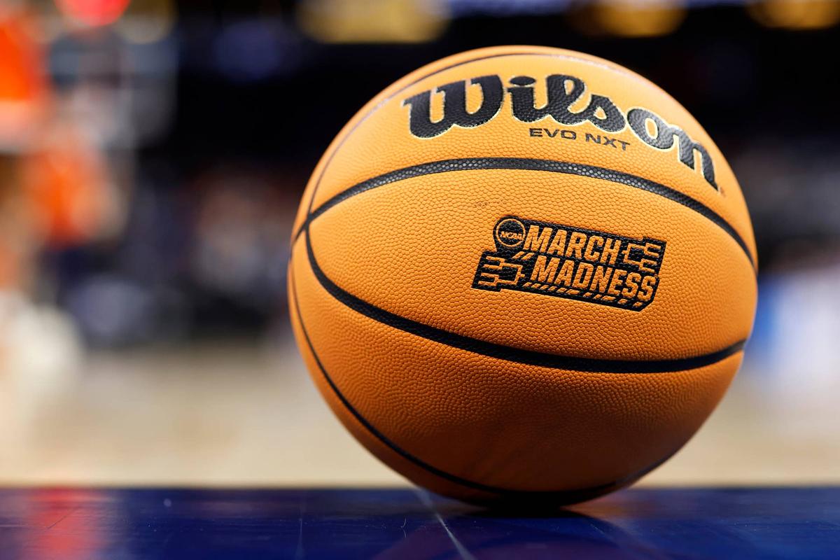  ORLANDO, FLORIDA - MARCH 16: A detailed view of the NCAA March Madness logo on a Wilson Evo NXT Match Ball during the second half in the first round of the NCAA Men's Basketball Tournament at Amway Center on March 16, 2023 in Orlando, Florida. (Photo by Mike Ehrmann/Getty Images) 
