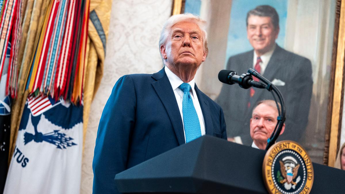 President Donald Trump speaks at a ceremony n the Oval Office of the White House in Washington on April 22. Paul Atkins was sworn in as the chairman of the Securities and Exchange Commission.