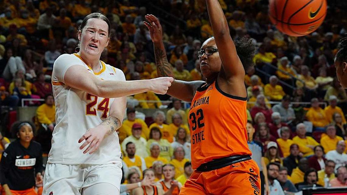  Iowa State Cyclones' forward Addy Brown (24) passes the ball around Oklahoma State Cowgirls guard Stailee Heard (32) during the first quarter in the senior day women basketball at Hilton Coliseum on February. 25, 2026, in Ames, Iowa. | Nirmalendu Majumdar/Ames Tribune / USA TODAY NETWORK via Imagn Images 