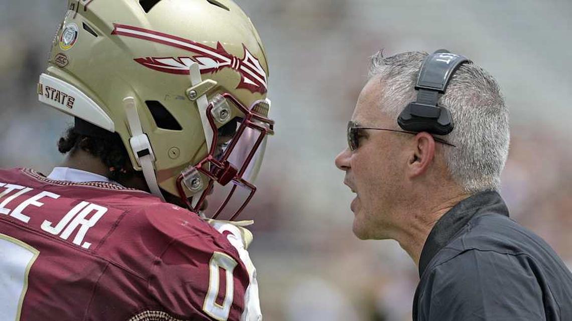  Sep 6, 2025; Tallahassee, Florida, USA; Florida State Seminoles head coach Mike Norvell speaks to safety Earl Little Jr. (0) during the second half against the East Texas A&M Lions at Doak S. Campbell Stadium. Mandatory Credit: Melina Myers-Imagn Images | Melina Myers-Imagn Images 