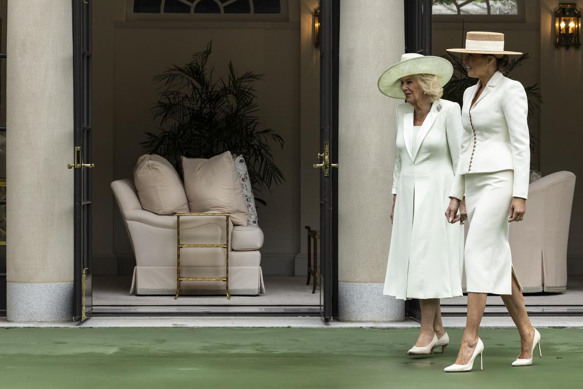 First lady Melania Trump, right, and Queen Camilla arrive for an event on "exploring U.S.-U.K. History through Innovation" at the White House Tennis Pavilion at the White House campus in Washington, on Tuesday, April 28, 2026. (Anna Rose Layden/The New York Times)