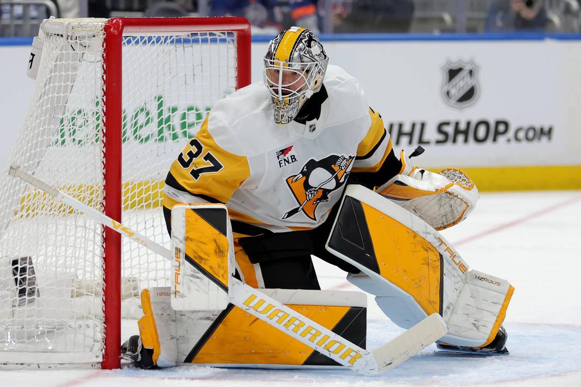  Pittsburgh Penguins goaltender Arturs Silovs (37) in the net against the New York Islanders. Brad Penner-Imagn Images
