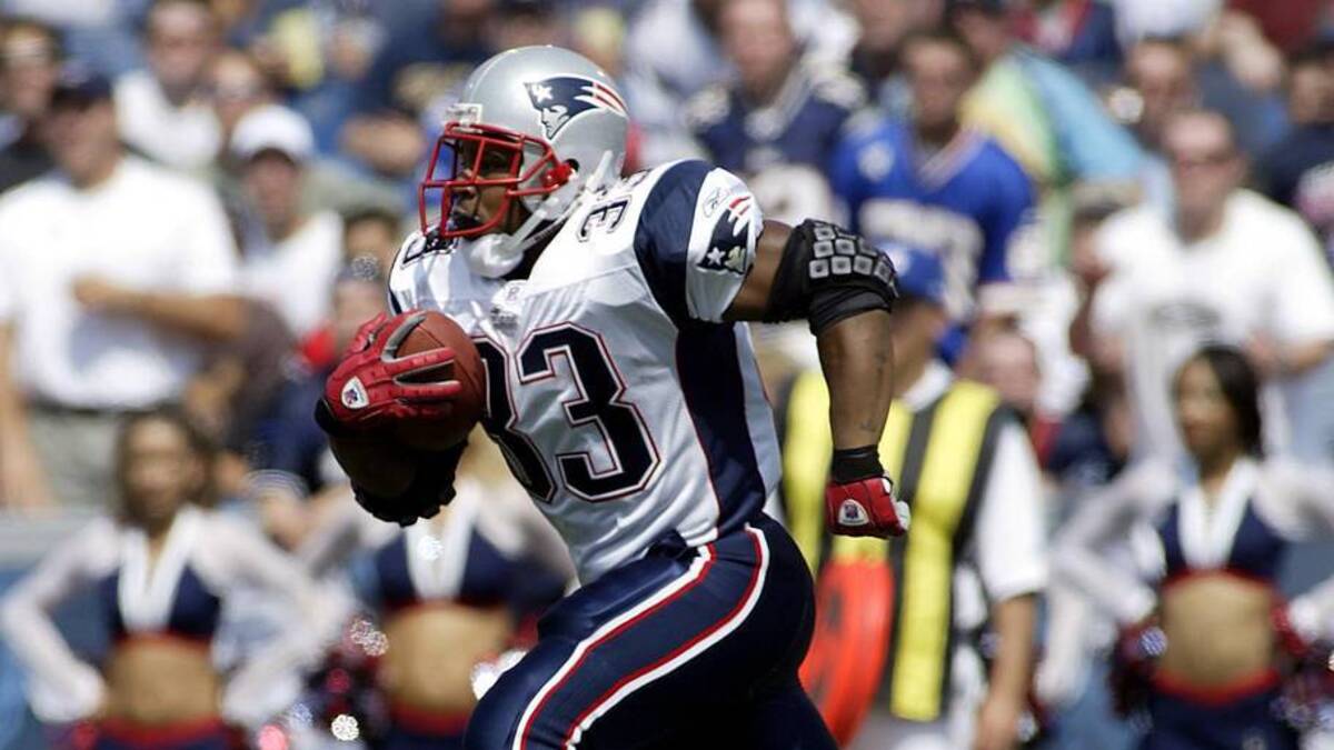  Sep 7, 2003; Orchard Park, NY, USA: FILE PHOTO; England Patriots running back Kevin Faulk (33) carries the ball against the Buffalo Bills at Ralph Wilson Stadium. Mandatory Credit: Richard Mackson-USA TODAY Network | Imagn Images 