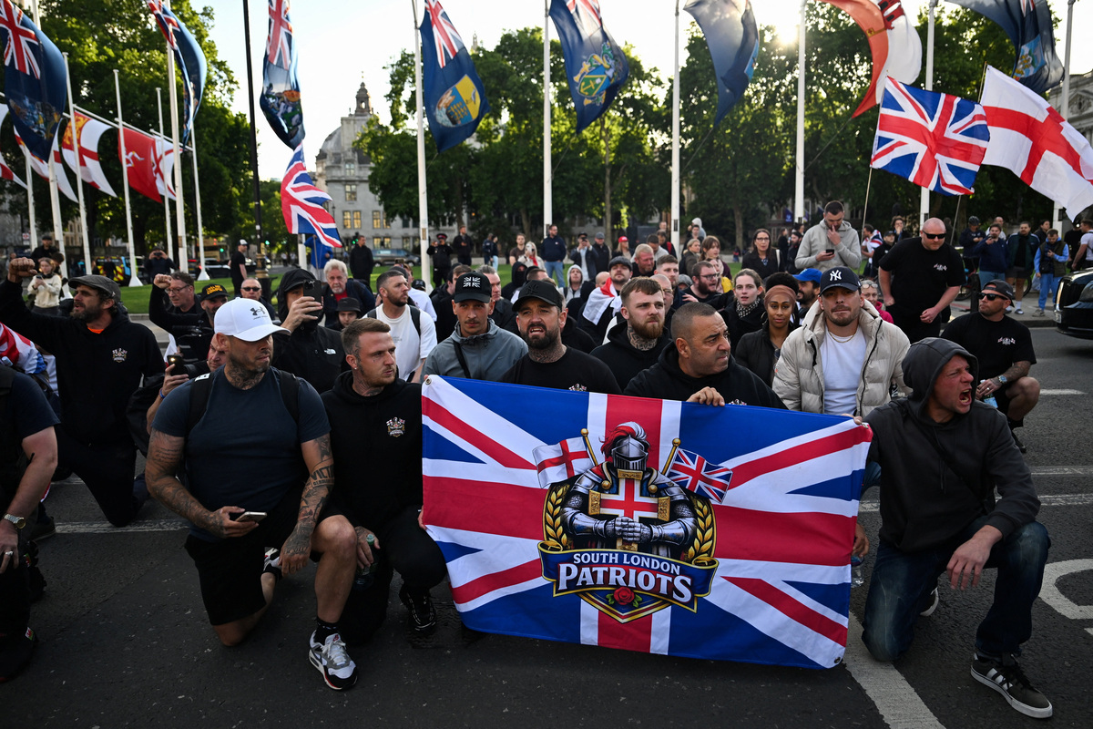 Protesters gather in Parliament Square following a knife attack in Belfast on June 8, that left a man seriously injured and prompted police to declare a critical incident, in London, Britain, June 9, 2026. REUTERS/Chris J. Ratcliffe