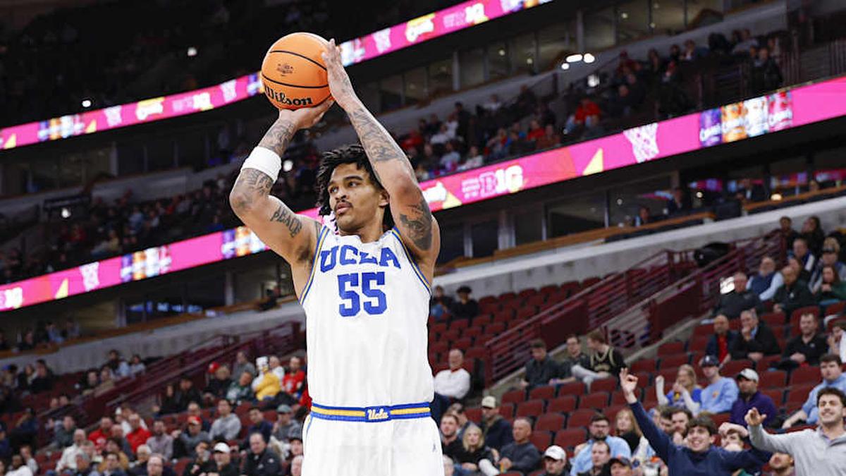  Mar 12, 2026; Chicago, IL, USA; UCLA Bruins guard Skyy Clark (55) shoots against the Rutgers Scarlet Knights during the second half at United Center. Mandatory Credit: Kamil Krzaczynski-Imagn Images | Kamil Krzaczynski-Imagn Images 