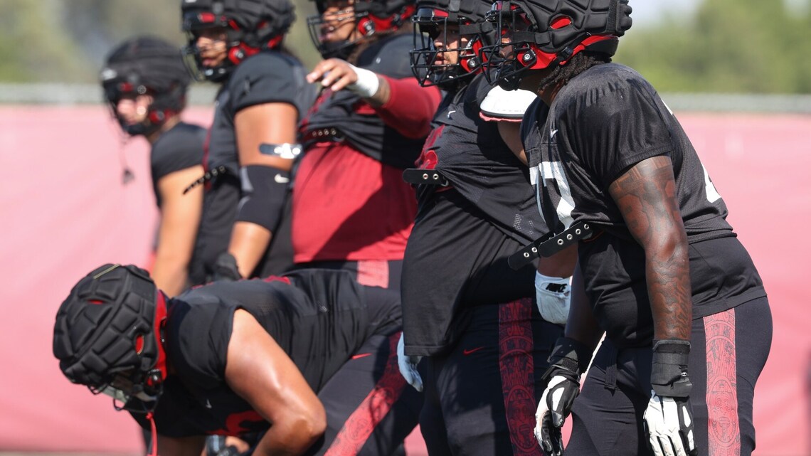 Aztecs quarterback, running back know the way to a lineman's heart is through his stomach 