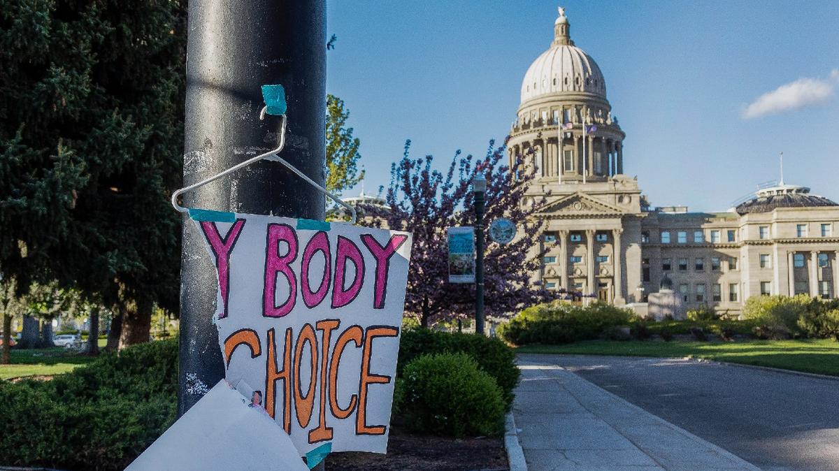 A sign taped to a hanger hangs near the Idaho Capitol in Boise after protests against the state’s new abortion laws, which effectively banned the procedure.
