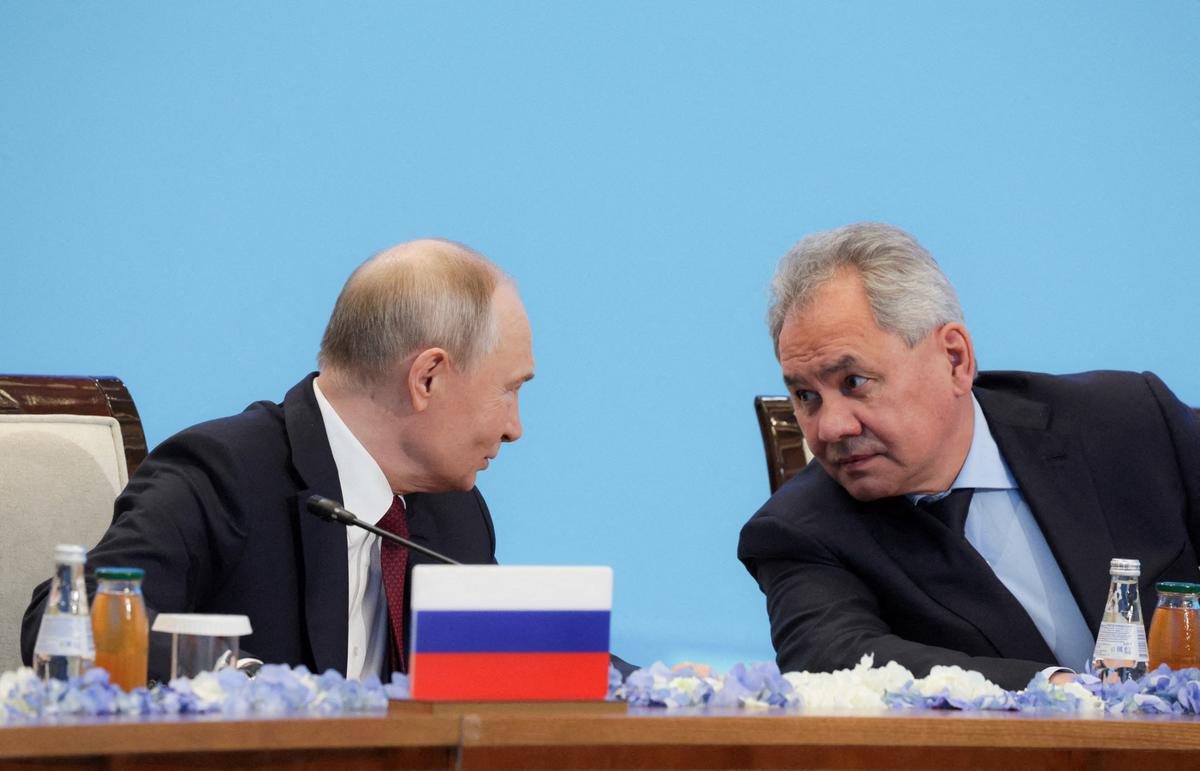 FILE PHOTO: Russia's President Vladimir Putin speaks with Security Council Secretary Sergei Shoigu at the Collective Security Treaty Organisation (CSTO) summit in Astana, Kazakhstan, November 28, 2024. Sputnik/Gavriil Grigorov/Kremlin via REUTERS/File Photo