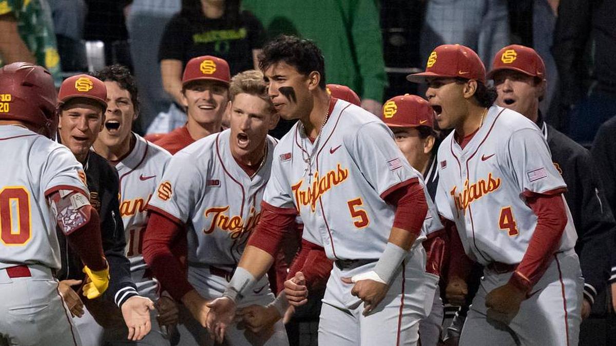  USC celebrates a home run by Isaac Cadena (20) as the Oregon Ducks host the USC Trojans on May 14, 2026, in Eugene, Oregon. | Ben Lonergan/The Register-Guard / USA TODAY NETWORK via Imagn Images 