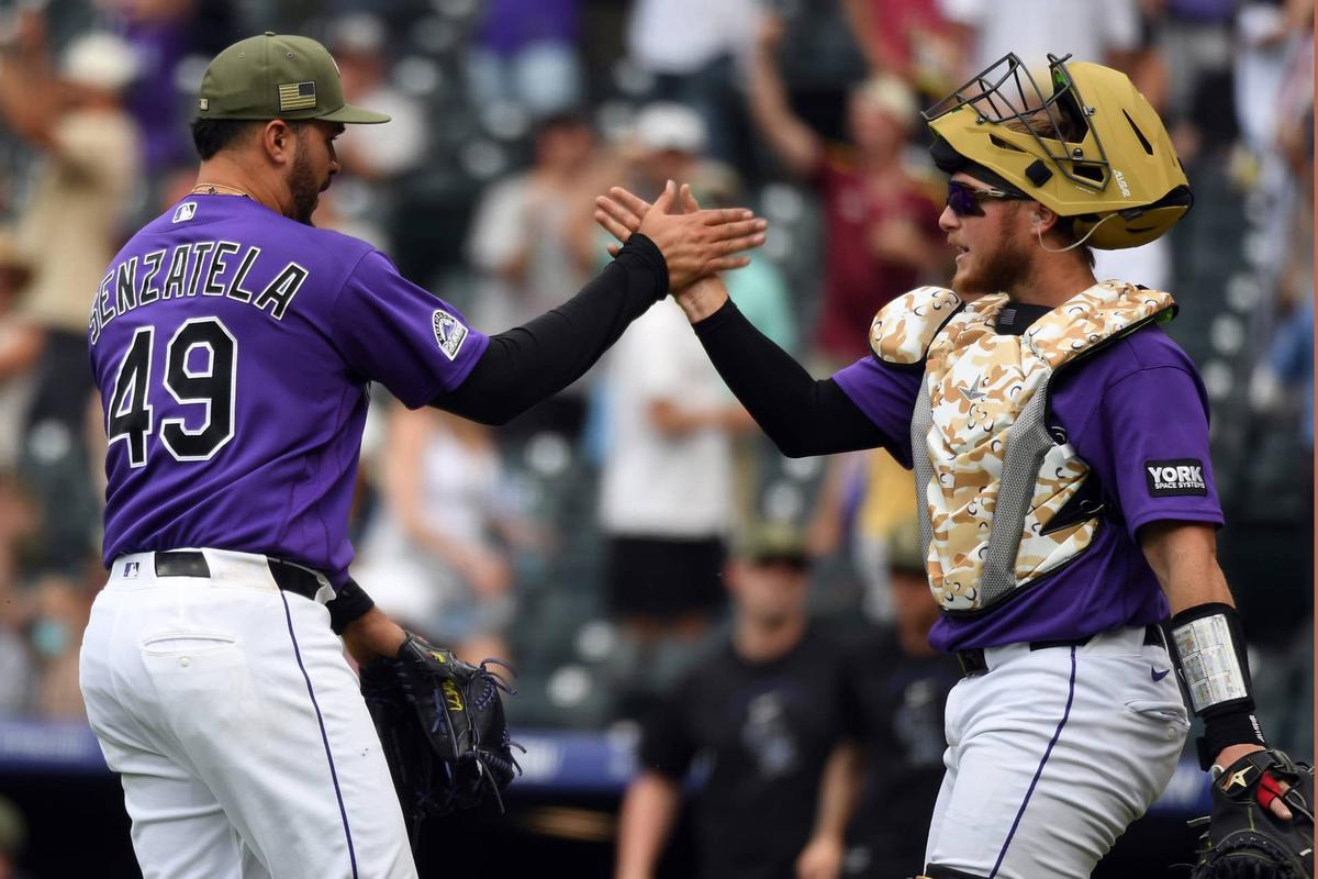  Colorado Rockies pitcher Antonio Senzatela (49) and Colorado Rockies catcher Hunter Goodman (15) 