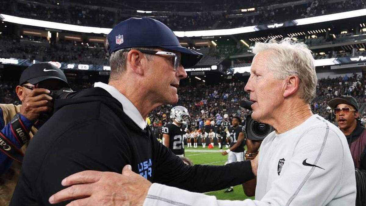  Sep 15, 2025; Paradise, Nevada, USA; Las Vegas Raiders head coach Pete Carroll and Los Angeles Chargers head coach Jim Harbaugh shake hands after the game at Allegiant Stadium. Mandatory Credit: Kiyoshi Mio-Imagn Images | Kiyoshi Mio-Imagn Images 