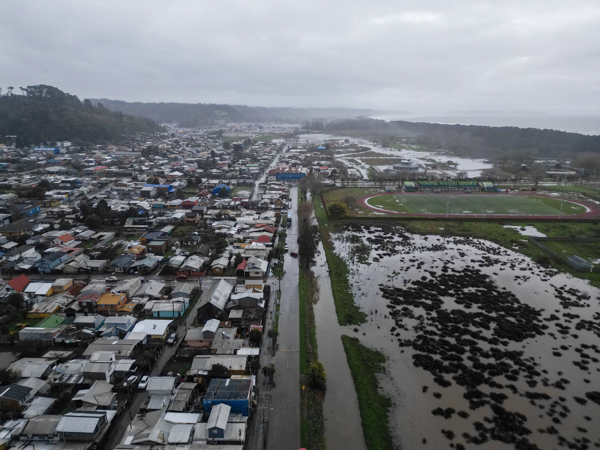 A drone view of a flooded area caused by the rain during a weather front that led the Chilean authorities to declare a preventive state of emergency at the start of the week, in Arauco, Chile, July 16, 2026. REUTERS/Juan Gonzalez