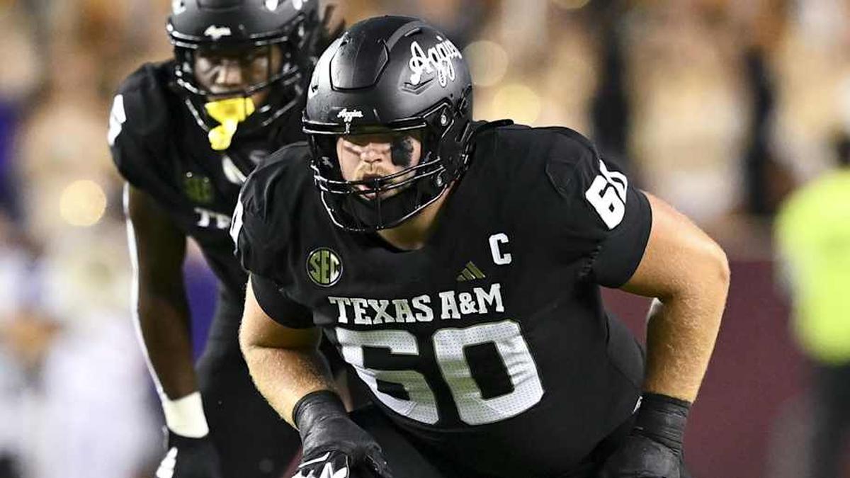  Oct 26, 2024; College Station, Texas, USA; Texas A&M Aggies offensive lineman Trey Zuhn III (60) lines up during the second quarter against the LSU Tigers. The Aggies defeated the Tigers 38-23; at Kyle Field. Mandatory Credit: Maria Lysaker-Imagn Images. | Maria Lysaker-Imagn Images 