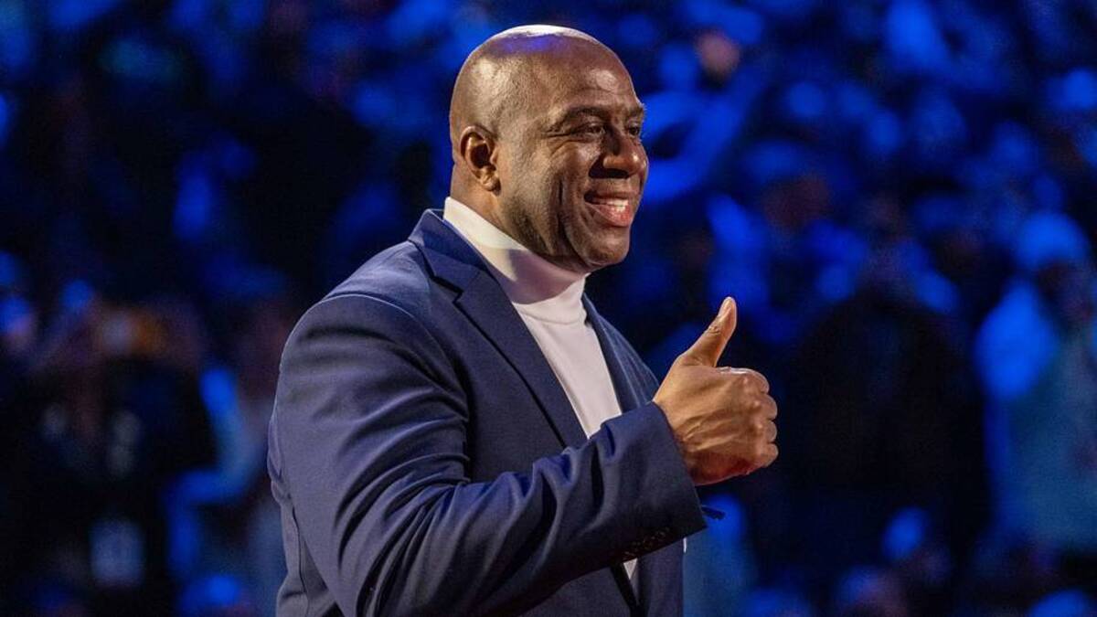  February 20, 2022; Cleveland, Ohio, USA; NBA great Magic Johnson is honored for being selected to the NBA 75th Anniversary Team during halftime in the 2022 NBA All-Star Game at Rocket Mortgage FieldHouse. Mandatory Credit: Kyle Terada-Imagn Images | Kyle Terada-Imagn Images 