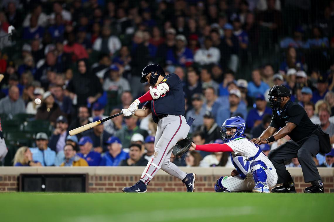 Braves shortstop Ha-Seong Kim (9) hits a three-run homer during the seventh inning against the Chicago Cubs at Wrigley Field Wednesday Sept. 3, 2025, in Chicago. (Armando L. Sanchez/Chicago Tribune)