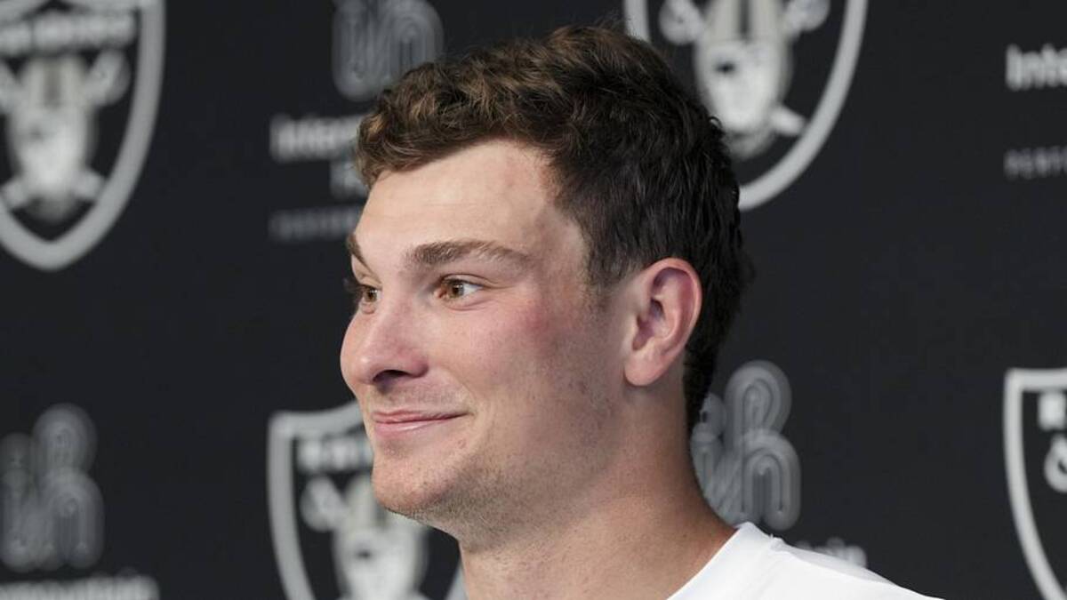  May 2, 2026; Henderson, NV, USA; Las Vegas Raiders quarterback Fernando Mendoza (15) speaks during a news conference at the team's Rookie Minicamp at Intermountain Health Performance Center. Mandatory Credit: Candice Ward-Imagn Images | Candice Ward-Imagn Images 