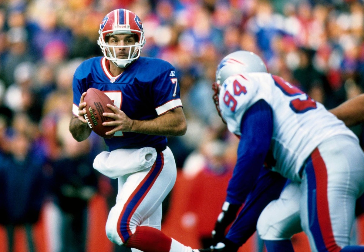  Buffalo Bills quarterback Doug Flutie drops back to pass against the New England Patriots. USA TODAY Sports