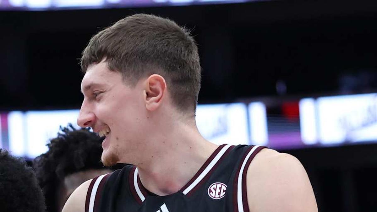  Dec 13, 2025; Salt Lake City, Utah, USA; Mississippi State Bulldogs guard King Grace (23) along with guard Dellquan Warren (1) and forward Sergej MacUra (11) celebrate a win over the Utah Utes after the game at Delta Center. Mandatory Credit: Rob Gray-Imagn Images | Rob Gray-Imagn Images 
