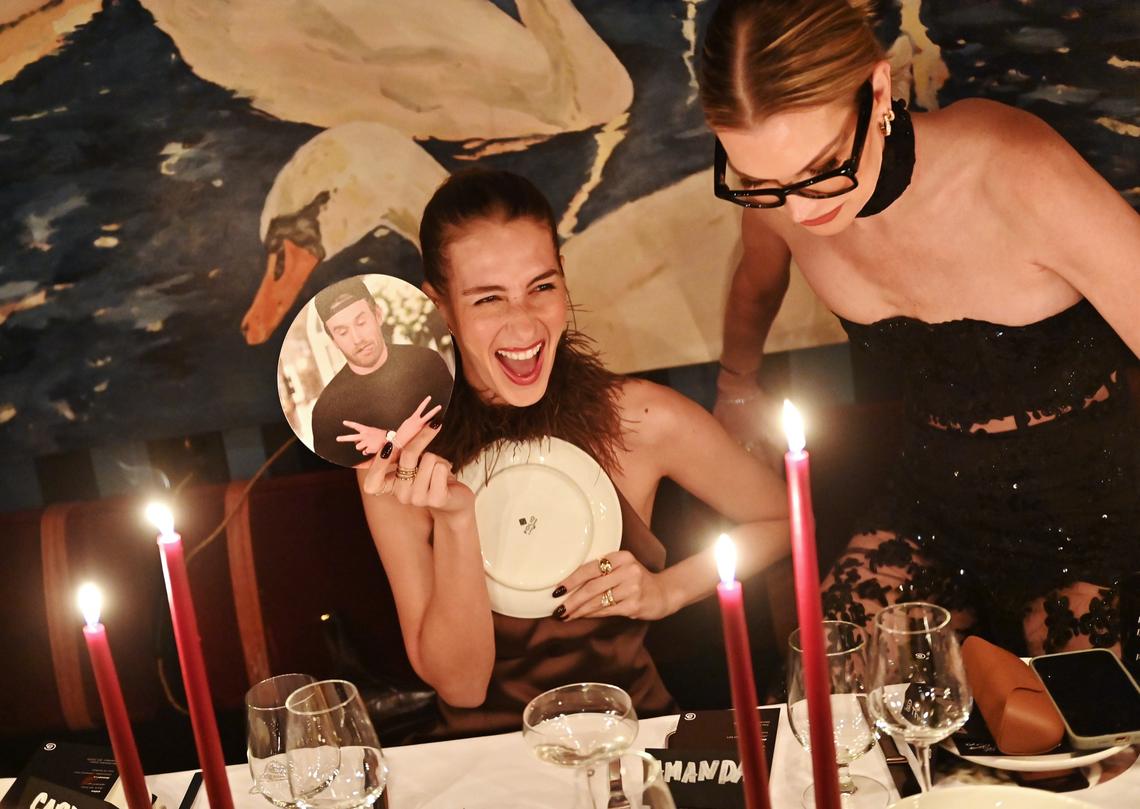 Amanda Batula holding West Wilson picture.