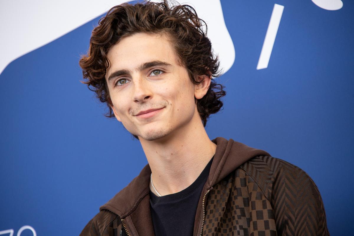 Timothee Chalamet poses for photographers during the 78th edition of the Venice Film Festival.