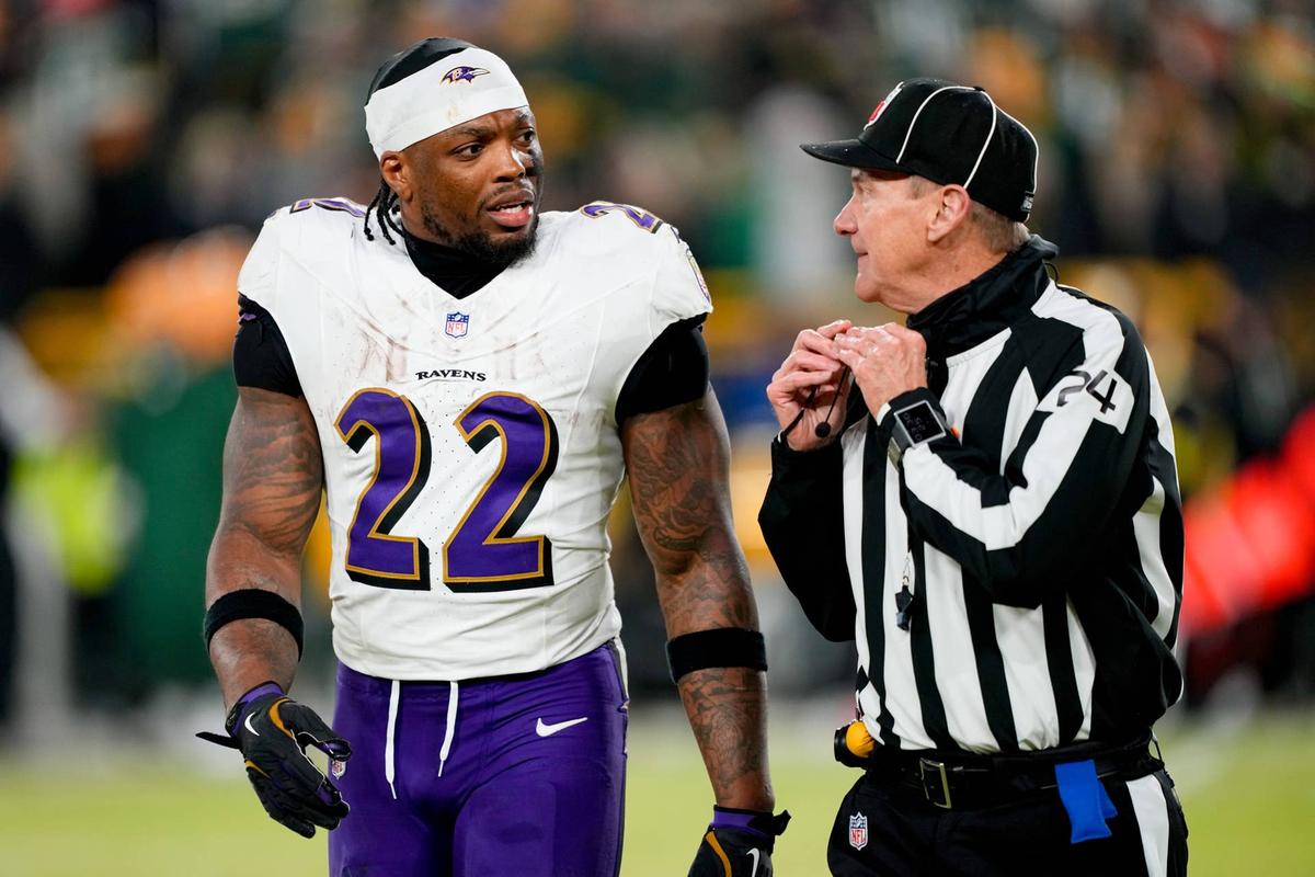  Dec 27, 2025; Green Bay, Wisconsin, USA; Baltimore Ravens running back Derrick Henry (22) talks to a referee during the second quarter against the Green Bay Packers at Lambeau Field. Mandatory Credit: Jeff Hanisch-Imagn Images Jeff Hanisch-Imagn Images 