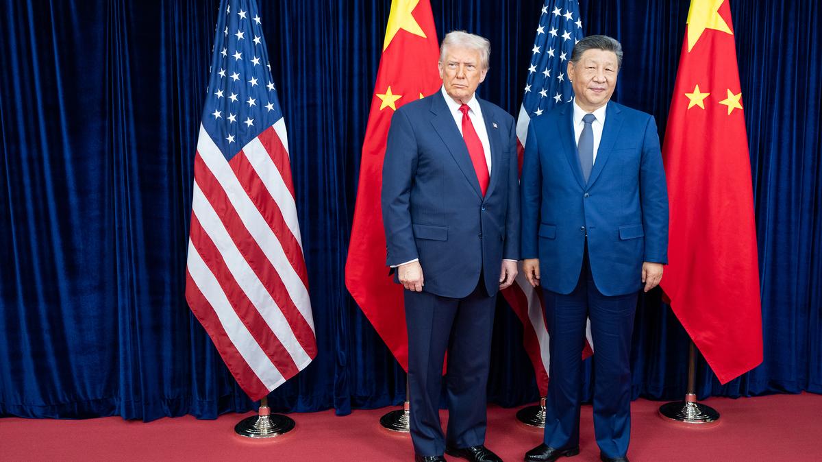 President Donald Trump meets with Chinese President Xi Jinping in Busan, South Korea, Oct. 30, 2025. A staff member on the House China Committee was promised $10,000 for U.S. policy insights, on issues like Venezuela and rare-earth minerals.