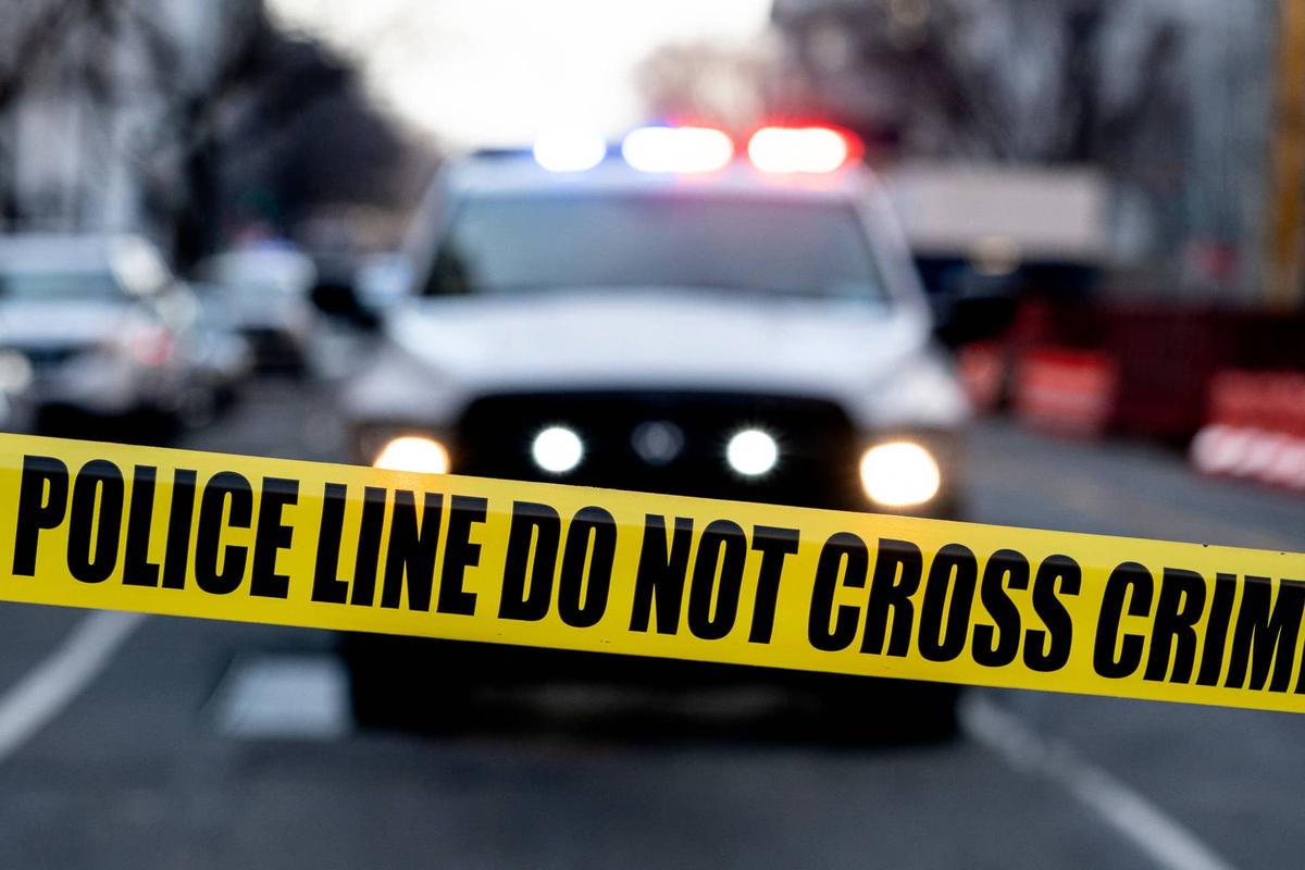  Police tape on street. 