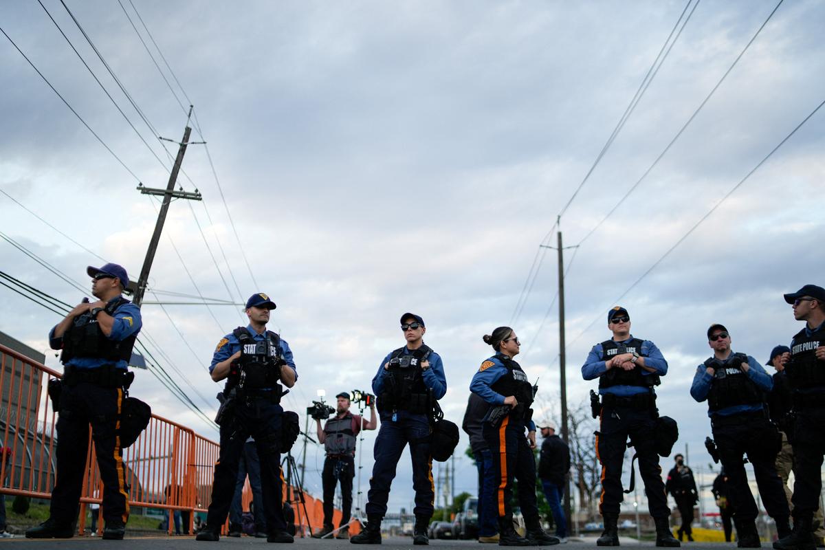New Jersey State Policemen set up a protest zone outside the Delaney Hall detention center, as demonstrators remain gathered outside, in Newark, New Jersey, U.S., May 29, 2026. REUTERS/Eduardo Munoz