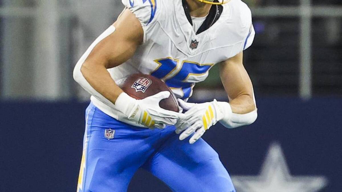  Dec 21, 2025; Arlington, Texas, USA; Los Angeles Chargers wide receiver Ladd McConkey (15) runs for yards after the catch against the Dallas Cowboys during the second quarter at AT&T Stadium. Mandatory Credit: Kevin Jairaj-Imagn Images | Kevin Jairaj-Imagn Images 