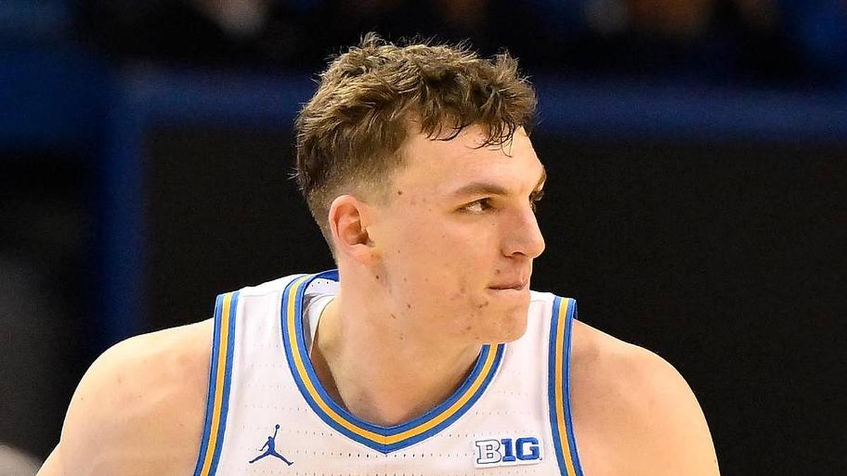  Feb 21, 2026; Los Angeles, California, USA; UCLA forward Tyler Bilodeau (34) runs back on defense after scoring a three-point basket during the second half against the Illinois Fighting Illini at Pauley Pavilion presented by Wescom Financial. Mandatory Credit: Robert Hanashiro-Imagn Images | Robert Hanashiro-Imagn Images 