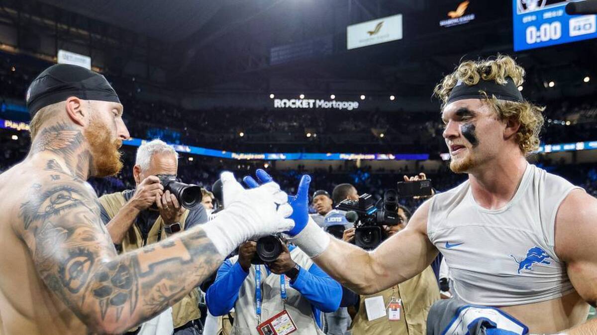  Detroit Lions defensive end Aidan Hutchinson, right, and Las Vegas Raiders defensive end Maxx Crosby exchange jerseys after the Lions' 26-14 win at Ford Field in Detroit on Monday, Oct. 30, 2023. | USA TODAY Network via Reuters Connect 