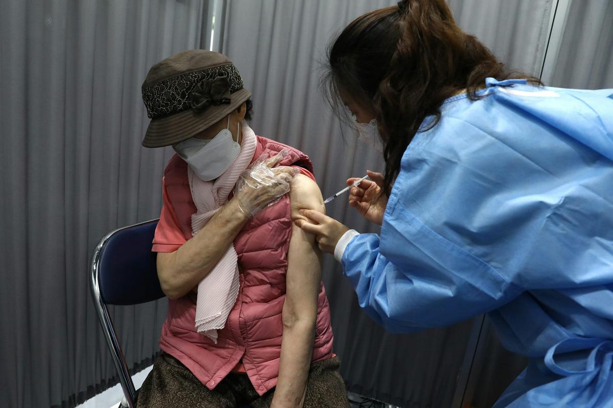  A South Korean woman receives a COVID-19 vaccine on April 1, 2021. Chung Sung-Jun/Getty Images 