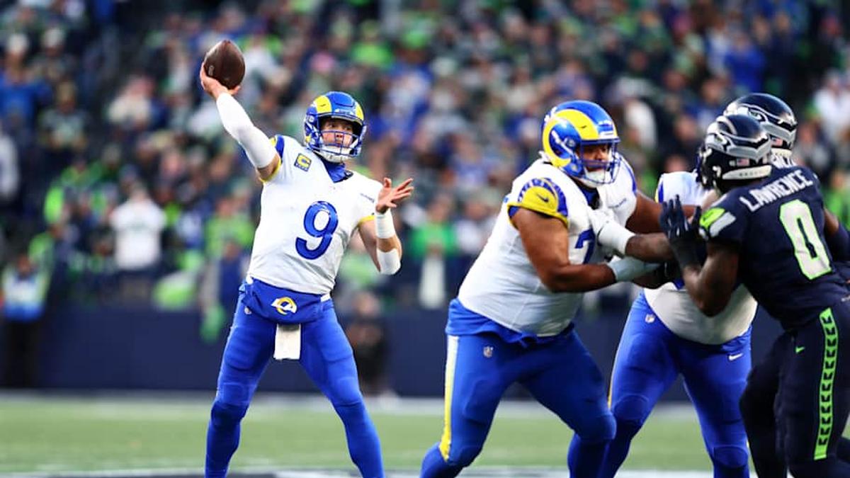  Jan 25, 2026; Seattle, WA, USA; Los Angeles Rams quarterback Matthew Stafford (9) passes against the Seattle Seahawks during the first half in the 2026 NFC Championship Game at Lumen Field. Mandatory Credit: Kevin Ng-Imagn Images | Kevin Ng-Imagn Images 