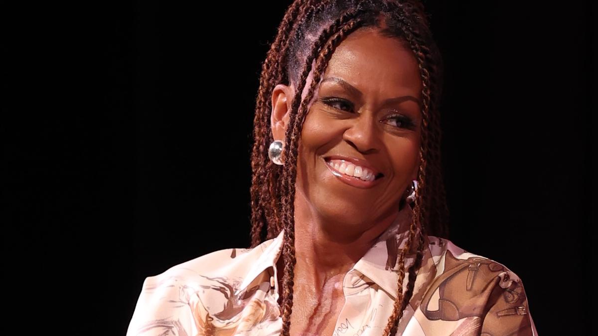 MARTHA'S VINEYARD, MASSACHUSETTS - AUGUST 09: Michelle Obama speaks during Higher Ground's "IMO with Michelle Obama & Craig Robinson" podcast during 2025 Martha's Vineyard African American Film Festival at Martha's Vineyard Performing Arts Center on August 09, 2025 in Martha's Vineyard, Massachusetts. (Photo by Arturo Holmes/Getty Images)