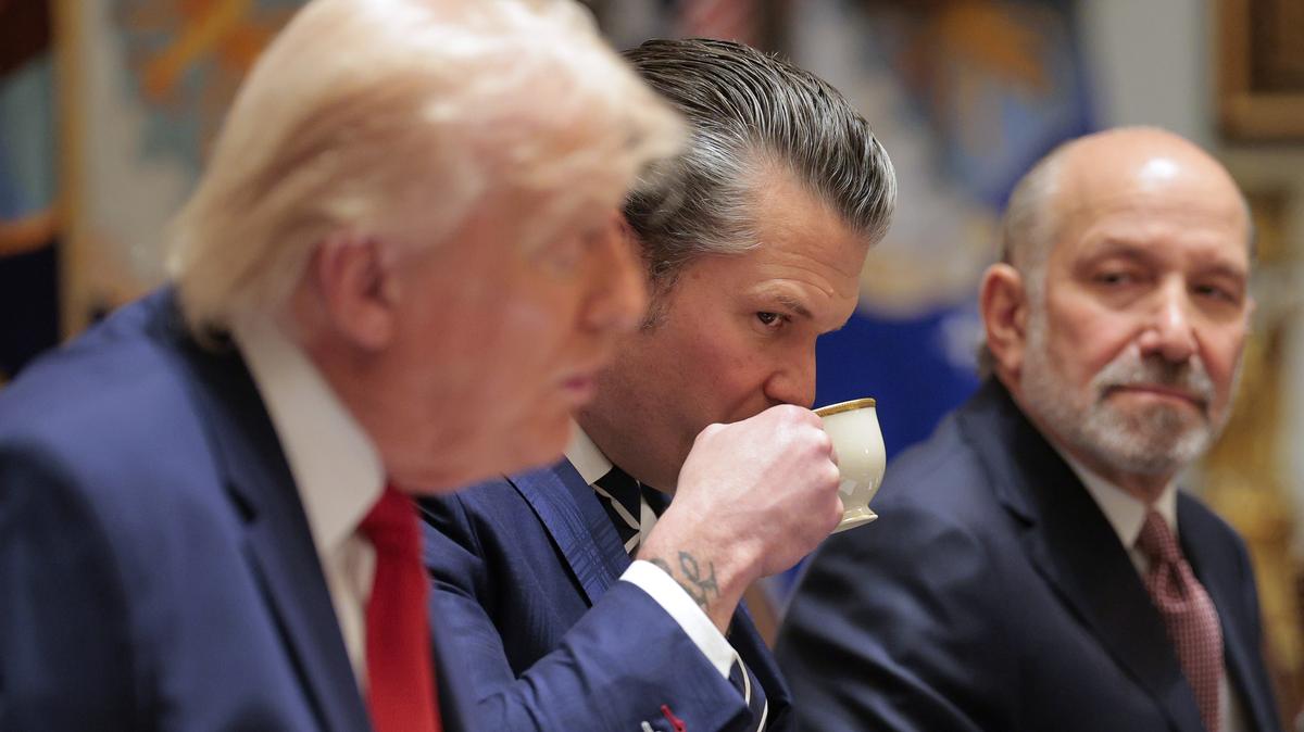 U.S. Secretary of War Pete Hegseth, center, sips a drink as U.S. President Donald Trump, left, speaks during a Cabinet meeting in the Cabinet Room of the White House on March 26, 2026, in Washington, D.C. This is Trump's second Cabinet meeting of 2026 and the first since the United States and Israel began attacking Iran on February 28. (Chip Somodevilla/Getty Images/TNS)